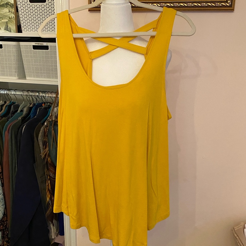 Back/front pictures of this yellow stretch cotton tank top, with a flowy bottom